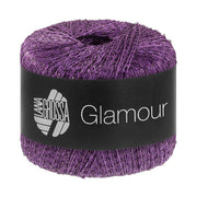 Lana Grossa Glamour 021 Donkerviolet bol pailletgaren gefotografeerd tegen een neutrale achtergrond