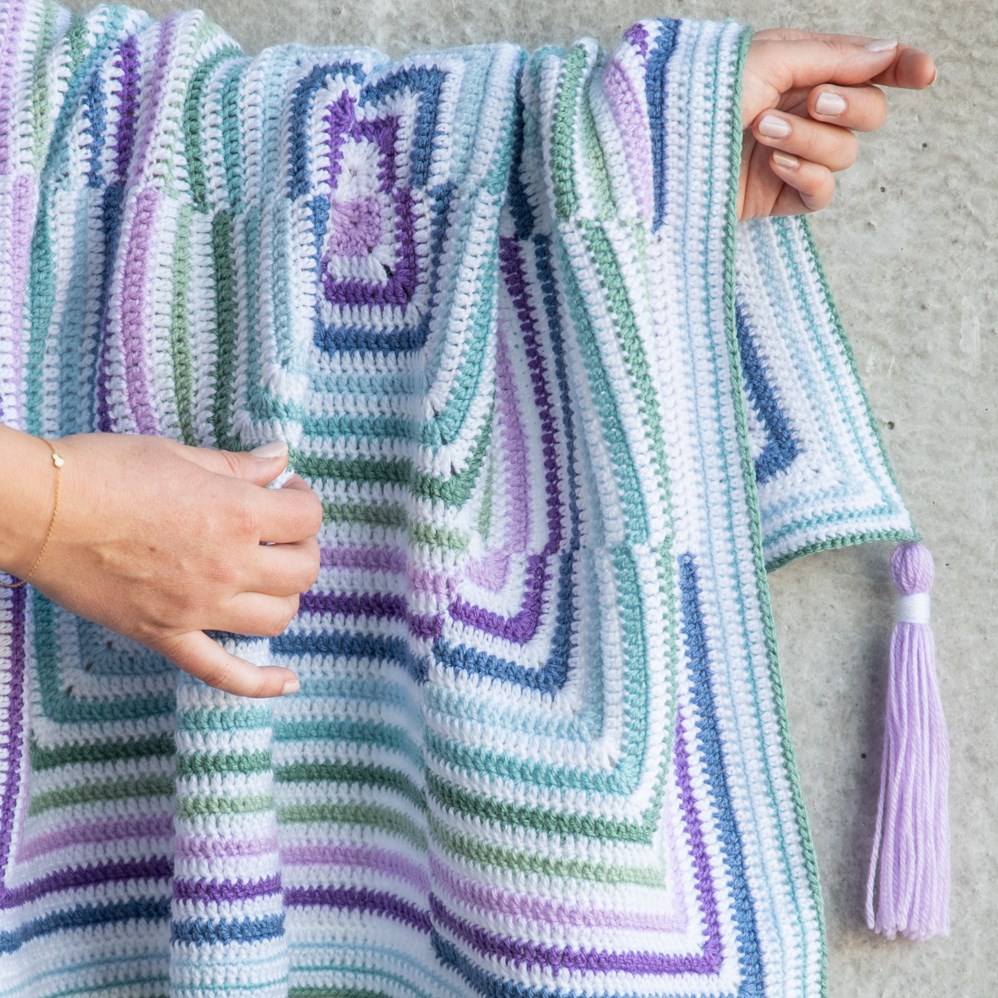 Blue and purple top crochet blanket